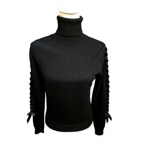 Carlise Black Turtleneck with Lace Up Detail On Sleeve